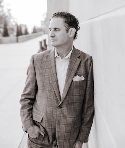 Massimo Rigotti in a plaid jacket, photographed in Lincoln